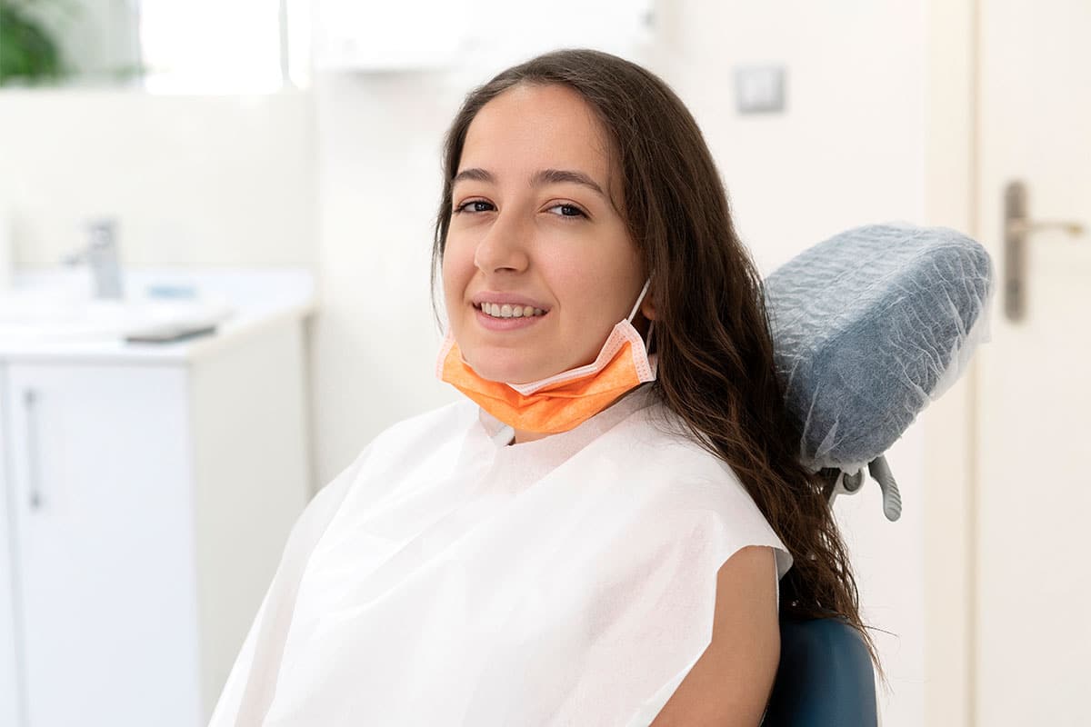 Lady in dentist chair image
